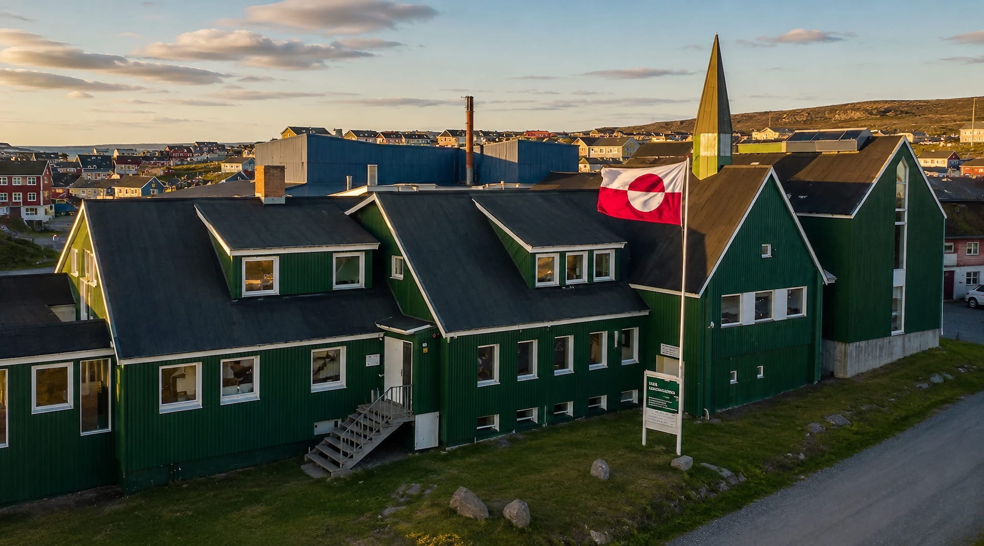 Greenland National Museum and Archives green colonial building on the Nuuk City Tour